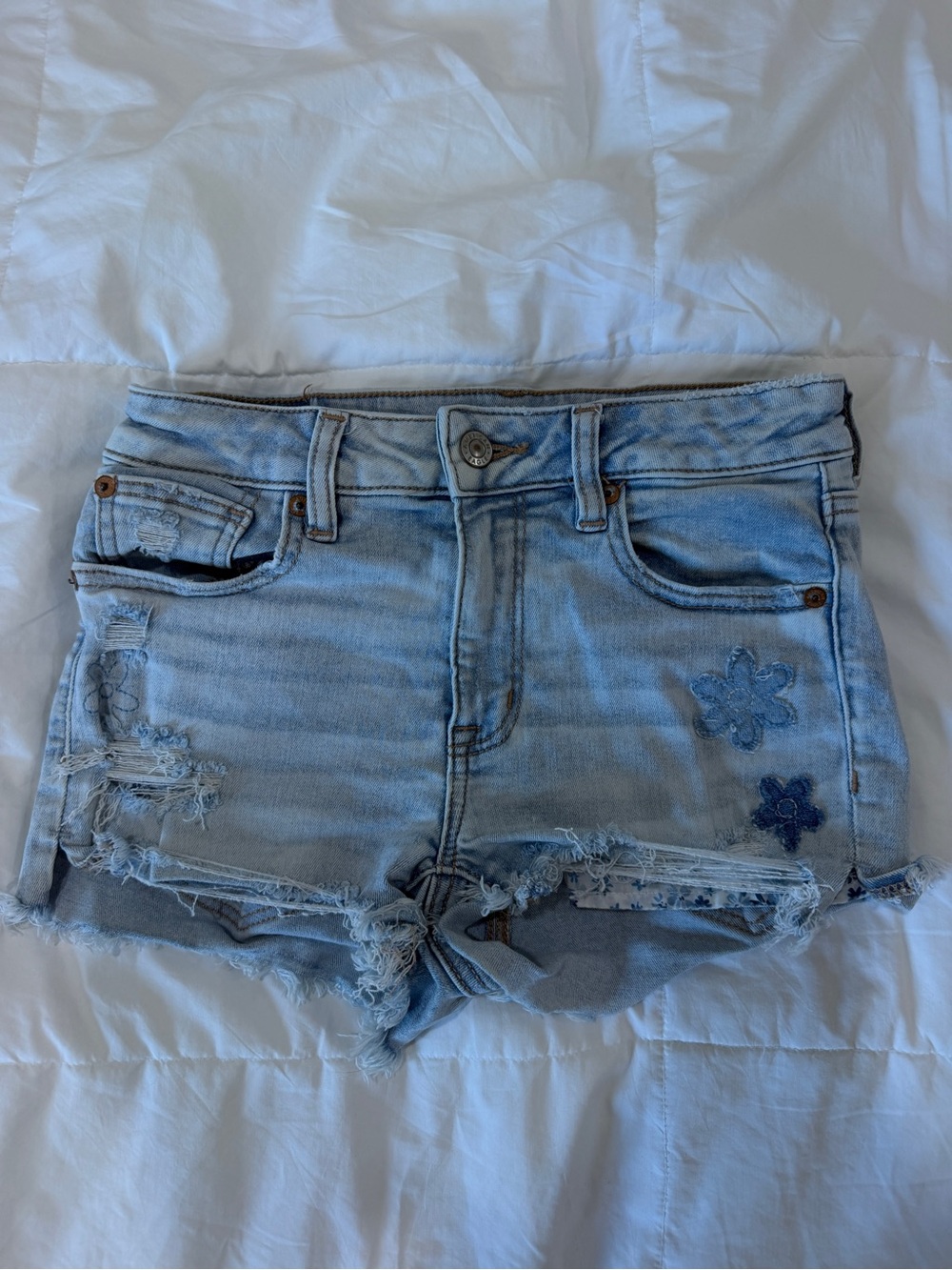 American Eagle Outfitters Light Blue Distressed Jean Shorts with Floral Patches